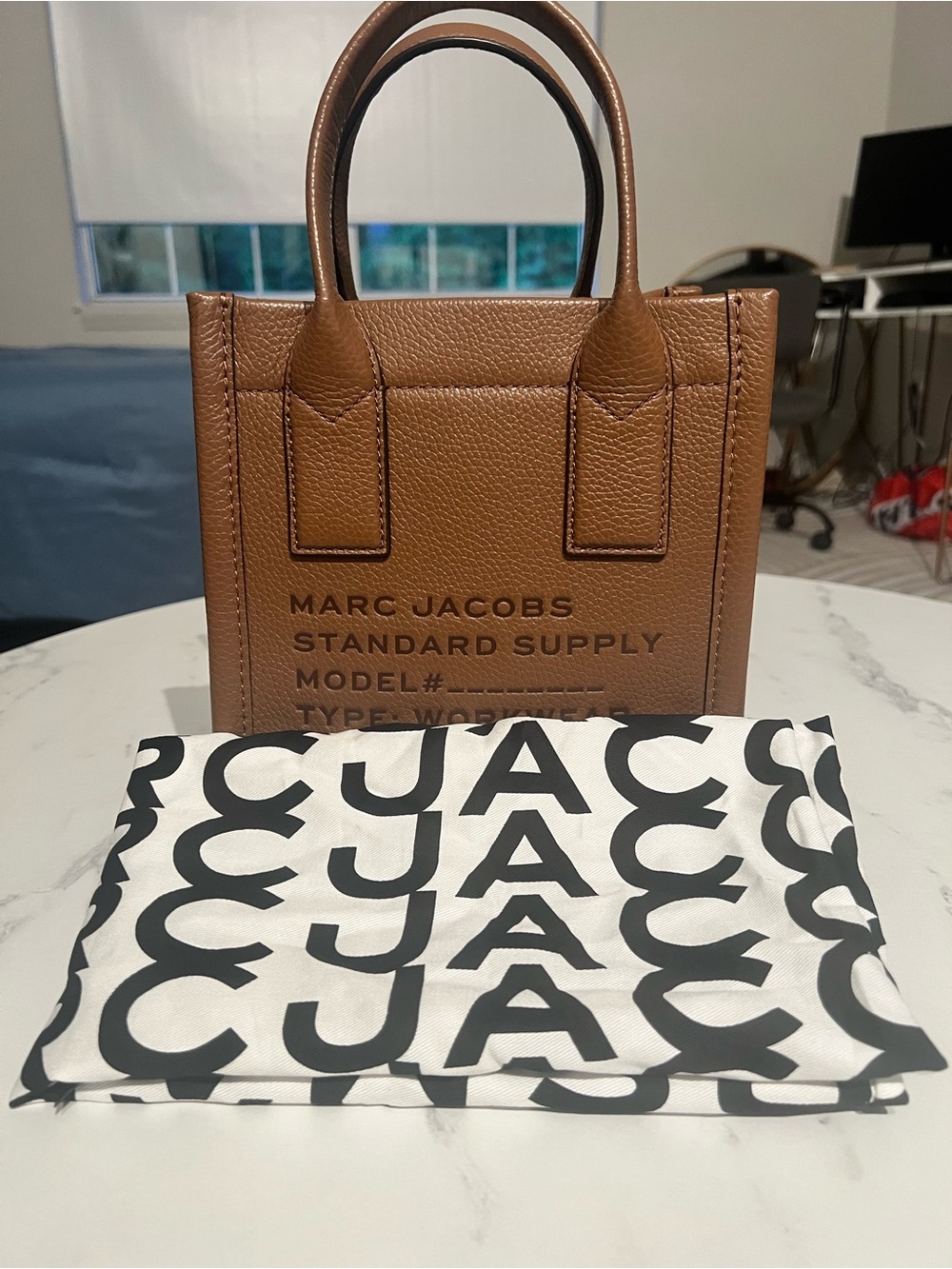 Authentic M Jacobs Cognac Pebbled. Leather Mini Tote. Original dustbag included. - Picture 8 of 9